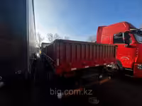 Бортовой полуприцеп 3-х осный Xinhongdong